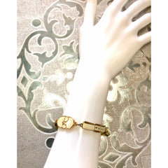 Vintage Roberta di Camerino chain bracelet with white logo charms. Beautiful jewelry. 0602071