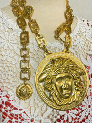 90s Vintage Gianni Versace Runway necklace with extra large Medusa face pendant top. Can be worn as a belt as well. Must have masterpiece. 061109y1