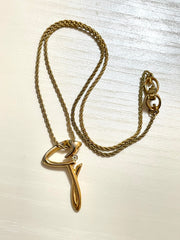 Vintage Givenchy golden chain necklace with g letter and crystal top. Classic jewelry that fits any occasion. 061127m1