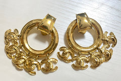 1990s. Vintage CHANEL Gold tone extra large hoop dangle earrings with dangling mini CC mark motifs. Must have gorgeous jewelry. 070617ac1