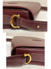 Vintage Cartier wine, bordeaux leather shoulder bag with embossed logo, purse from must de Cartier collection. Great daily bag. 070128ac3
