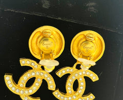 Vintage CHANEL dangle earrings with crystal CC motif and round logo embossed motif on top. Gorgeous vintage Chanel jewelry. 061214y1