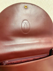 Vintage Cartier wine leather handbag with gold-tone closure. les must de cartier collection. Made in Italy. Classic and elegant. 080114tr4