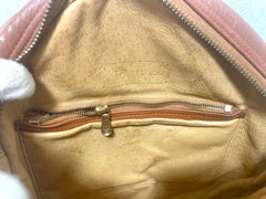 Vintage MCM brown monogram round Suzy Wong shoulder bag with brown leather trimmings. Designed by Michael Cromer. Unisex. 070325ac4
