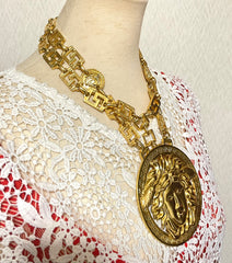 90s Vintage Gianni Versace Runway necklace with extra large Medusa face pendant top. Can be worn as a belt as well. Must have masterpiece. 061109y1