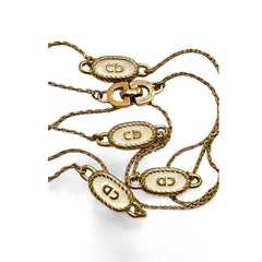 Vintage Christian Dior skinny golden chain necklace with gold and white oval CD charms. Classic Dior jewelry. Long necklace. 060130ac2