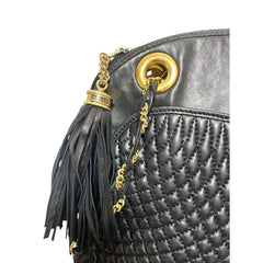 Vintage BALLY black quilted leather oval top shape shoulder bag with a fringe and golden B charm. Classic daily use design. 080819ys4