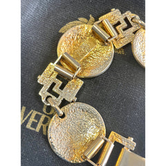 Vintage Gianni Versace gold tone medusa face motif bracelet with crystals. Must have Lady Gaga style jewelry piece. 060308m