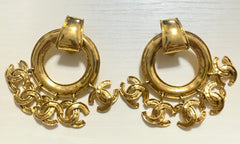 1990s. Vintage CHANEL Gold tone extra large hoop dangle earrings with dangling mini CC mark motifs. Must have gorgeous jewelry. 070617ac1