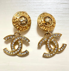 Vintage CHANEL dangle earrings with crystal CC motif and round logo embossed motif on top. Gorgeous vintage Chanel jewelry. 061214y1