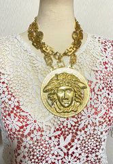 90s Vintage Gianni Versace Runway necklace with extra large Medusa face pendant top. Can be worn as a belt as well. Must have masterpiece. 061109y1