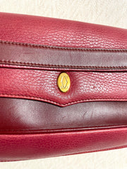 Vintage Cartier wine leather clutch bag with gold tone logo motif. Classic purse from must de Cartier Collection. 080114tr2