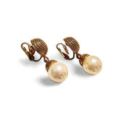 Vintage Nina Ricci golden and white faux pearl dangling earrings. Classic and beautiful jewelry piece. 060421ya