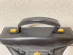 Vintage Bally black leather retro pop design bag, business purse with gold tone drawstrings and unique flap cut design.  Unisex use. 160315