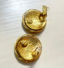 1990s. Vintage CHANEL golden round earrings with twisted frames and CC mark. Classic vintage Chanel jewelry. 070624ac1