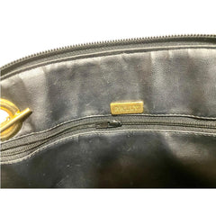 Vintage BALLY black quilted leather oval top shape shoulder bag with a fringe and golden B charm. Classic daily use design. 080819ys4