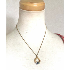 Vintage LANVIN golden skinny chain necklace with golden round pendant top. Clear crystals and green glass stone. Perfect gift. 050407r4