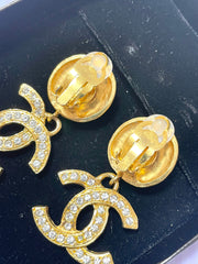 Vintage CHANEL dangle earrings with crystal CC motif and round logo embossed motif on top. Gorgeous vintage Chanel jewelry. 061214y1