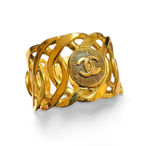 Vintage Chanel golden nice and heavy bangle with sunburst CC mark motif. Must have gorgeous jewelry. 051212ac1