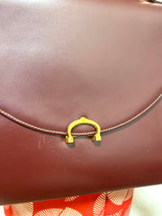 Vintage Cartier wine leather handbag with gold-tone closure. les must de cartier collection. Made in Italy. Classic and elegant. 080114tr4