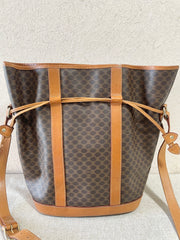 Vintage Celine hobo bucket shoulder bag in classic brown triomphe pattern with leather straps. 070218ys8