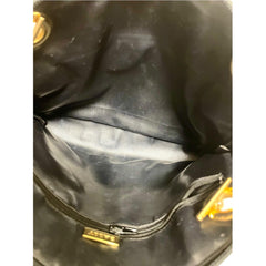 Vintage BALLY black quilted leather oval top shape shoulder bag with a fringe and golden B charm. Classic daily use design. 080819ys4