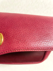 Vintage Cartier wine leather clutch bag with gold tone logo motif. Classic purse from must de Cartier Collection. 080114tr2