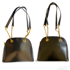 Vintage Celine classic bolide design shoulder bag in black leather with golden chains and red compartment. riri zipper. 060123ac3