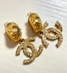 Vintage CHANEL dangle earrings with crystal CC motif and round logo embossed motif on top. Gorgeous vintage Chanel jewelry. 061214y1