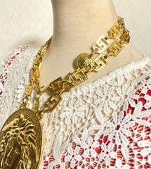 90s Vintage Gianni Versace Runway necklace with extra large Medusa face pendant top. Can be worn as a belt as well. Must have masterpiece. 061109y1