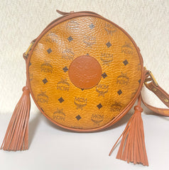 Vintage MCM brown monogram round Suzy Wong shoulder bag with brown leather trimmings. Designed by Michael Cromer. Unisex. 070325ac4