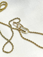 Vintage Christian Dior golden skinny chain necklace with logo embossed rectangular pendant top. 070131ys2