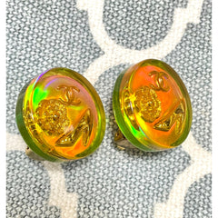 Vintage CHANEL yellow orange tone aurora resin earrings with Chanel iconic charms. Golden shoe, camellia, and CC mark in it. 041228an1