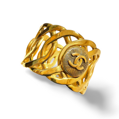 Vintage Chanel golden nice and heavy bangle with sunburst CC mark motif. Must have gorgeous jewelry. 051212ac1