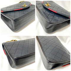 80's vintage Chanel dark navy lambskin 2.55 classic shoulder bag with gold chain and turn lock cc closure. Unique oval red edges. 051205ac4