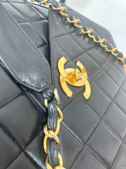 Vintage Chanel classic large black lambskin 2.55 square shape chain shoulder bag with golden large CC closure. Must have purse. 0404081