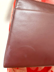 Vintage Cartier wine leather handbag with gold-tone closure. les must de cartier collection. Made in Italy. Classic and elegant. 080114tr4