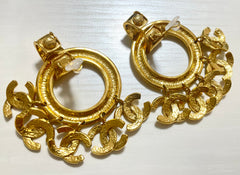 1990s. Vintage CHANEL Gold tone extra large hoop dangle earrings with dangling mini CC mark motifs. Must have gorgeous jewelry. 070617ac1