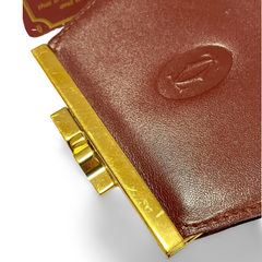 Vintage Cartier wine leather coin case purse with gold tone kiss lock closure. must de Cartier. Unisex. 070909y1
