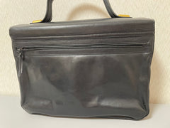 Vintage Bally black leather retro pop design bag, business purse with gold tone drawstrings and unique flap cut design.  Unisex use. 160315