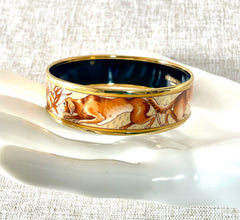 Vintage HERMES gold and brown tone and cloisonné/enamel bangle with rabbit, dog, and fox design. 070310ac2