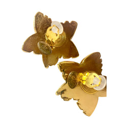 1990s. Vintage Christian Lacroix gold-tone star earrings. Heavy statement jewelry with a rich chocolate-inspired look. 080830ys1