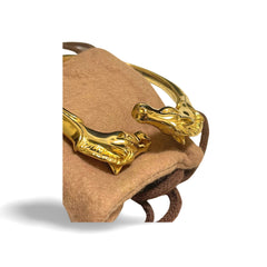 Vintage Hermes golden double horse head design bangle, bracelet. Beautiful classic jewelry from Hermes. 060220m