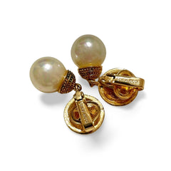 Vintage Nina Ricci golden and white faux pearl dangling earrings. Classic and beautiful jewelry piece. 060421ya