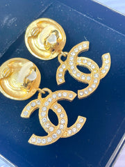 Vintage CHANEL dangle earrings with crystal CC motif and round logo embossed motif on top. Gorgeous vintage Chanel jewelry. 061214y1