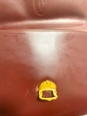 Vintage Cartier wine leather handbag with gold-tone closure. les must de cartier collection. Made in Italy. Classic and elegant. 080114tr4