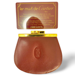 Vintage Cartier wine leather coin case purse with gold tone kiss lock closure. must de Cartier. Unisex. 070909y1