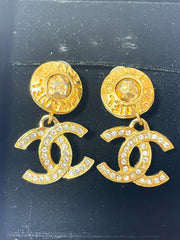 Vintage CHANEL dangle earrings with crystal CC motif and round logo embossed motif on top. Gorgeous vintage Chanel jewelry. 061214y1