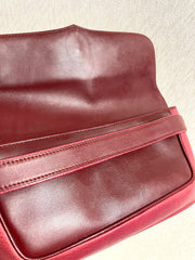 Vintage Cartier wine leather clutch bag with gold tone logo motif. Classic purse from must de Cartier Collection. 080114tr2