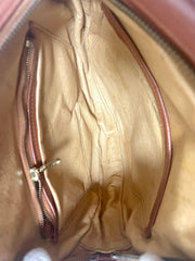 Vintage MCM brown monogram round Suzy Wong shoulder bag with brown leather trimmings. Designed by Michael Cromer. Unisex. 070325ac4